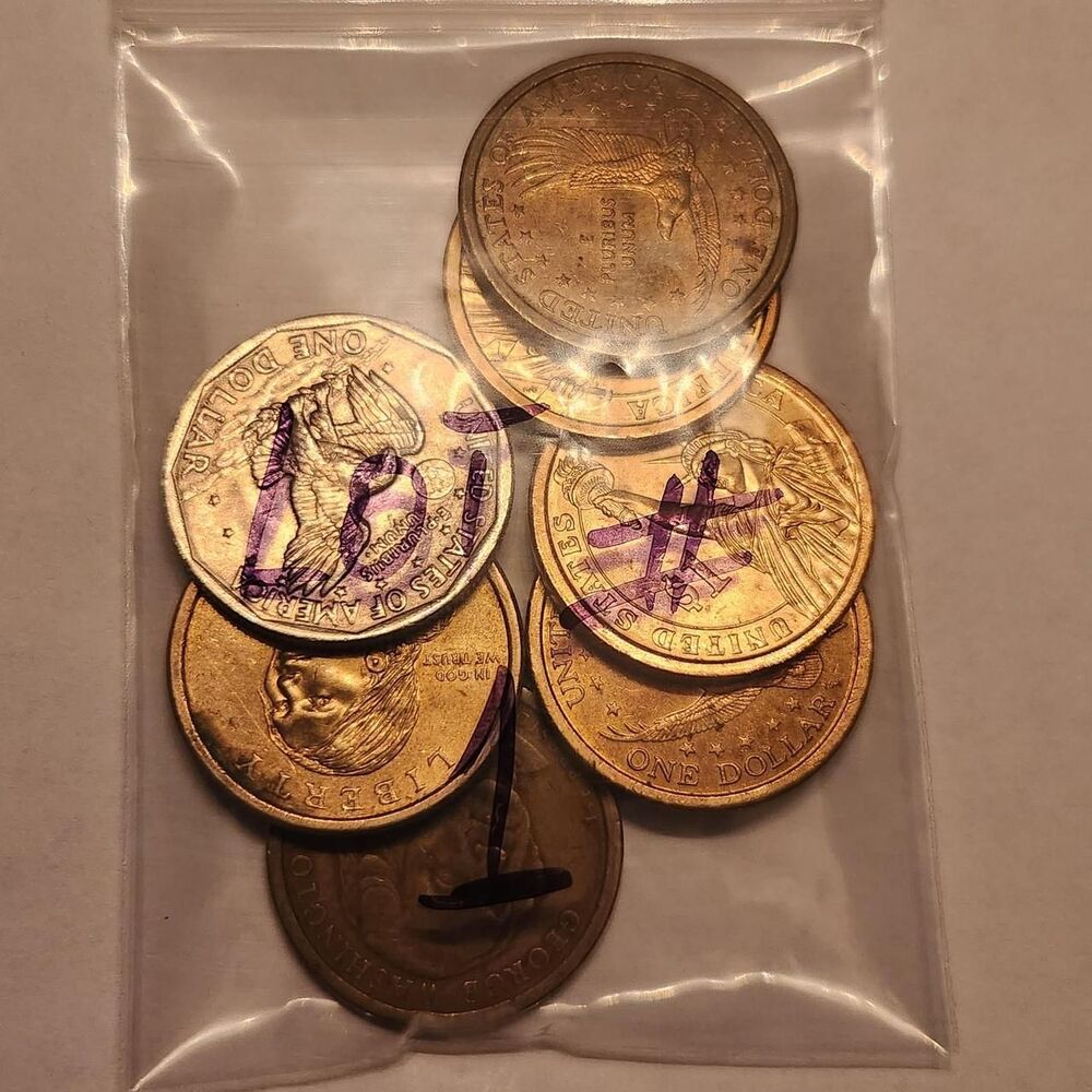 LOT OF SEVEN.
Nice Mix of 1Dollar coins. Start...
